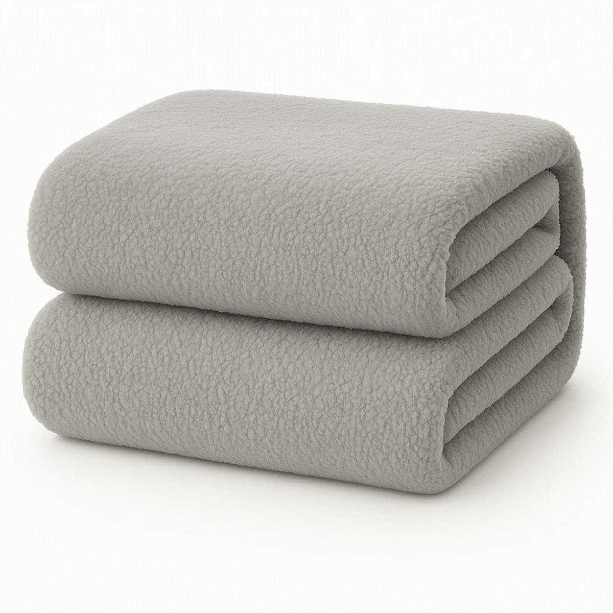 Een netjes opgevouwen Teddy fleece hoeslaken - 90x200 cm, lichtgrijs en extra warm, op een effen witte ondergrond.